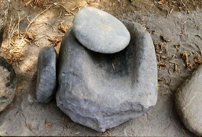 Corn grinding stone by Peruvian School